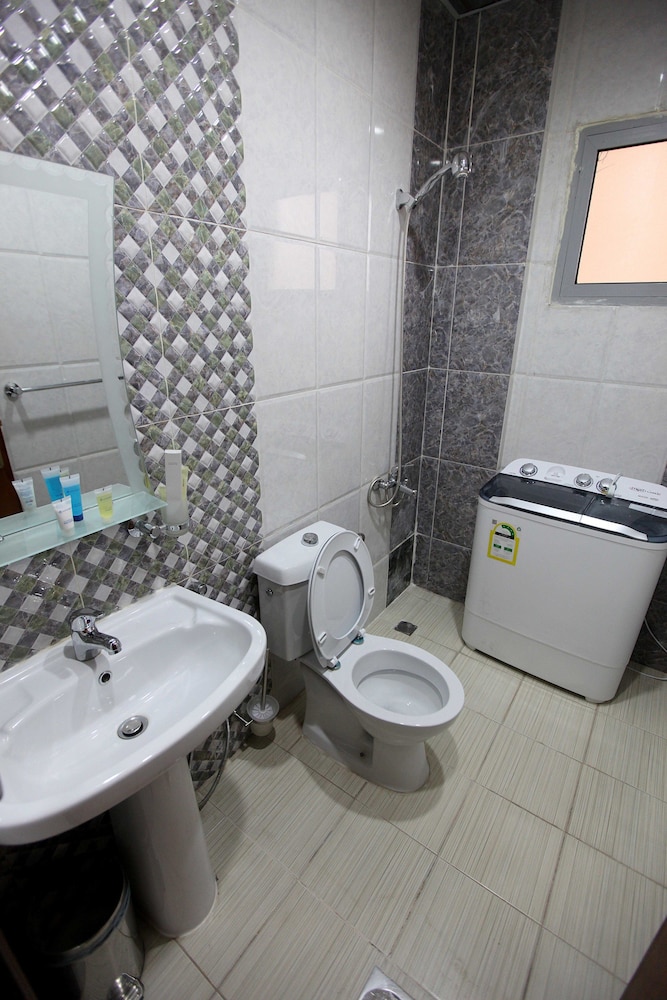 فندق برج العنوان(Enwan Suites Serviced Apartments) 41/47