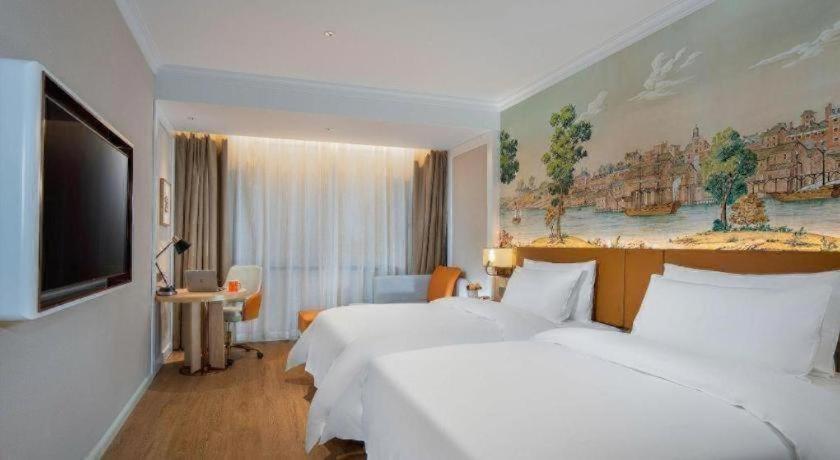 Vienna Hotel (Tianjin chentangzhuang subway station store) 25/59