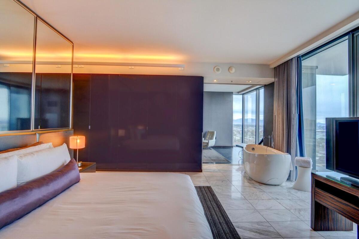 1 Bedroom Balcony Collection Living Room & Jet Tub Bath - StripSuite Palms Place Hotel 10/31