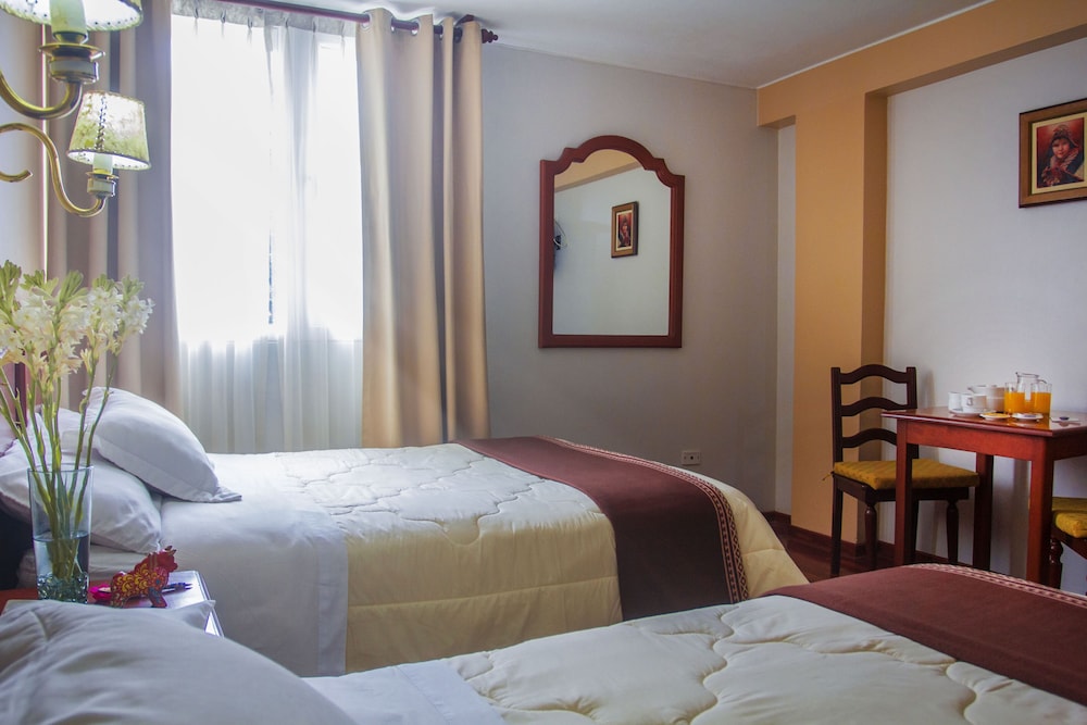 MANHATTAN INN AIRPORT HOTEL 27/73
