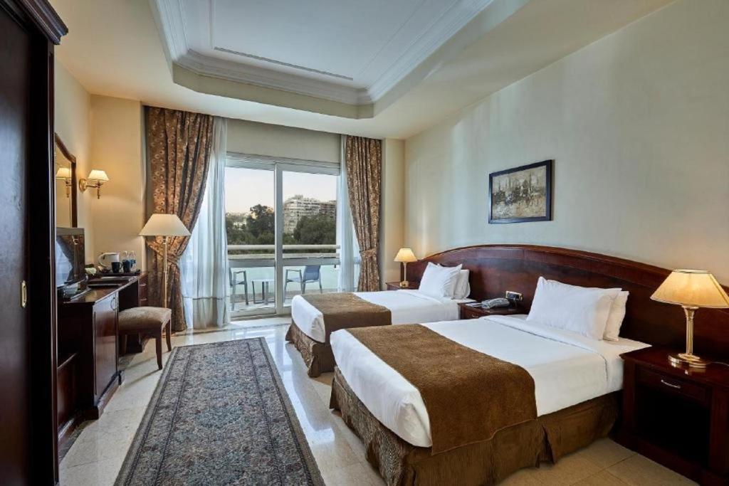Room at Triumph Plaza Hotel, CAIRO