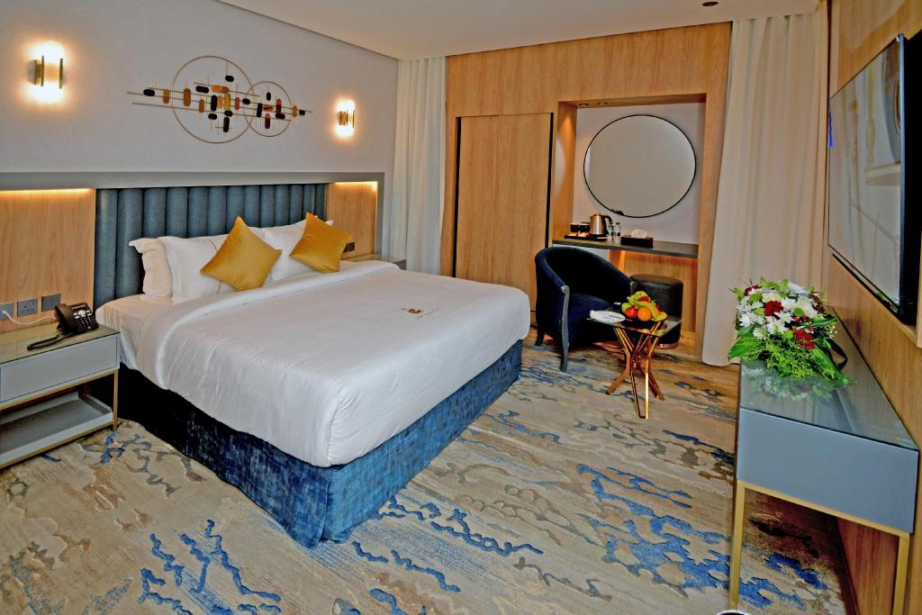 غرفة قياسية بسرير كينج وسرير كوين، فندق ايه دبليو الرياض(AW Hotel Riyadh) 8/10