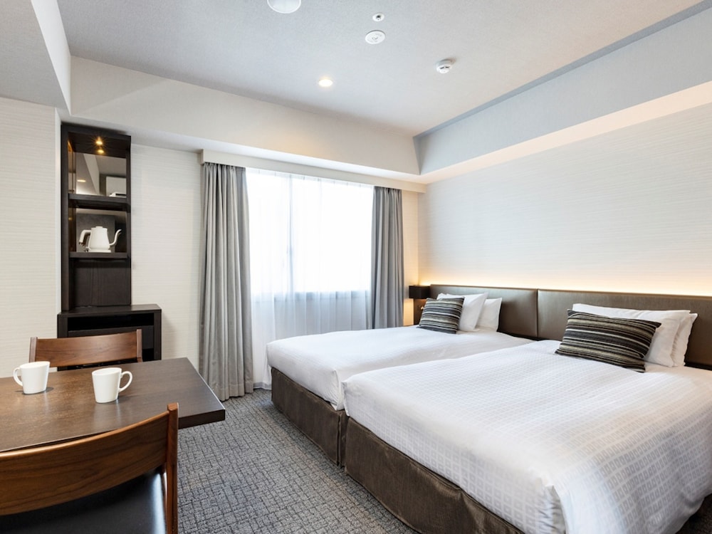 DELUXE, TWIN BEDS, LAUNDRY
