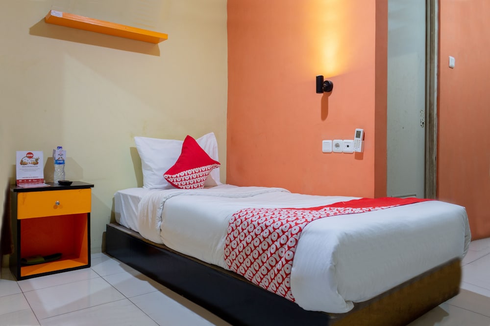 Oyo 989 Audah Guesthouse Syariah 15/36