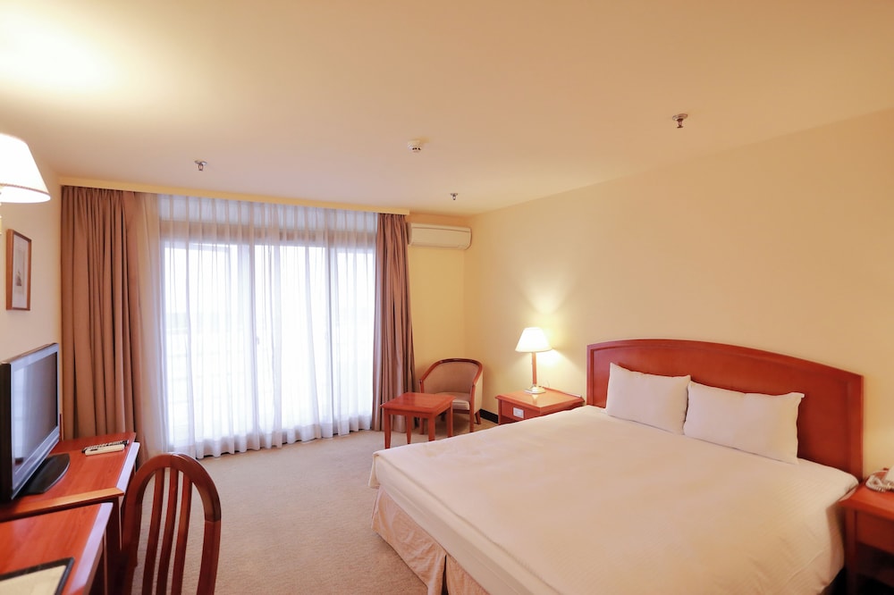 غرفة قياسية بسرير كوين، Landis Inn Lotung 3/10