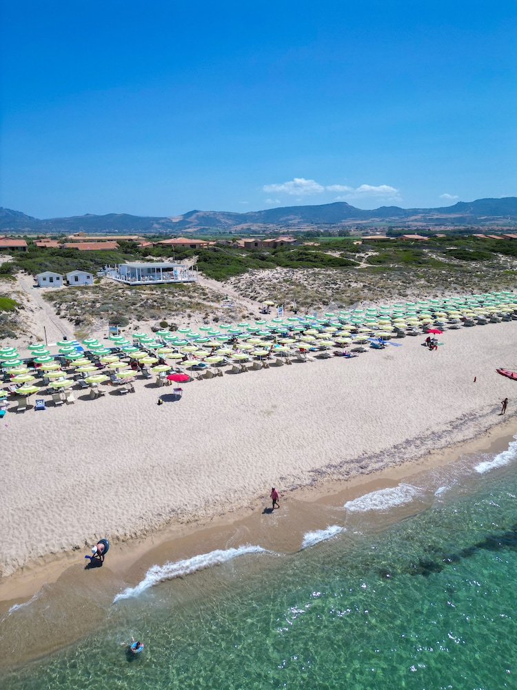 Mimose Beach Village 50/50