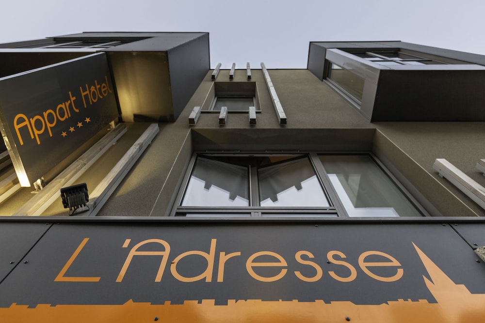 L Adresse 1/61