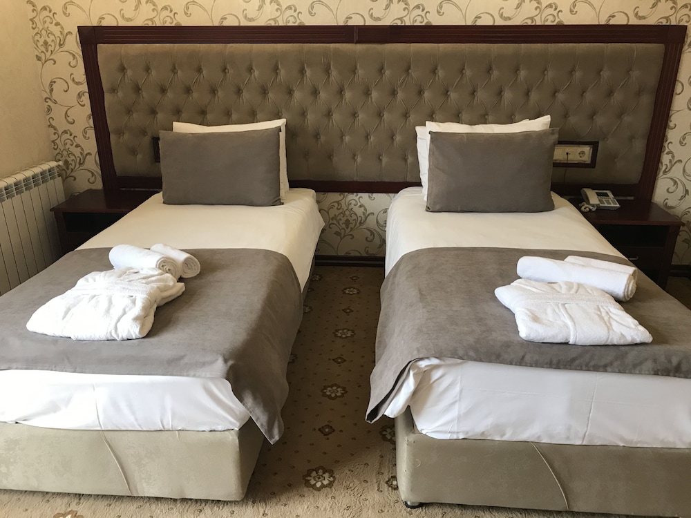 غرفة كومفورت رباعية بأربعة أسرّة، Capitol Hotel 5/7