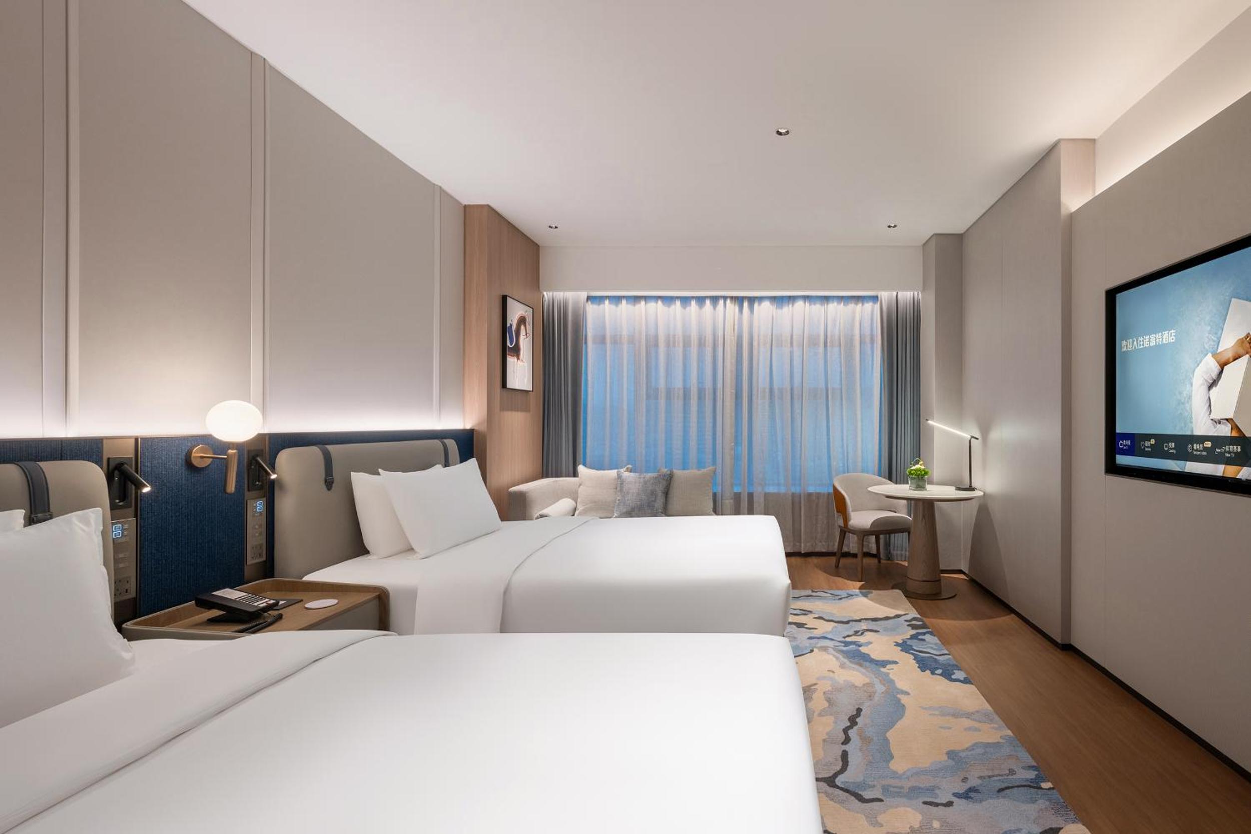 غرفة ديلوكس بسريرين مزدوجين، Novotel Zhoushan Luting 2/5