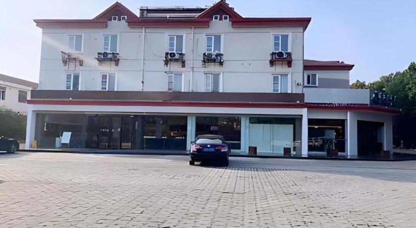 Magnolia Hotel (Yixing bus station store) 4/64
