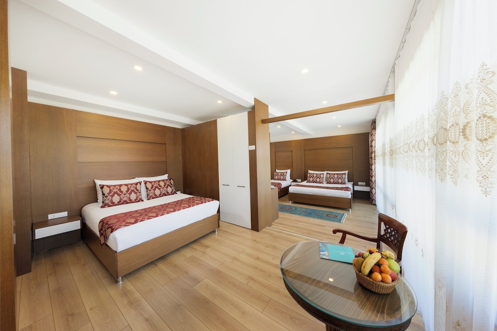 Deluxe, Family, 1 Single and 2 Double Beds