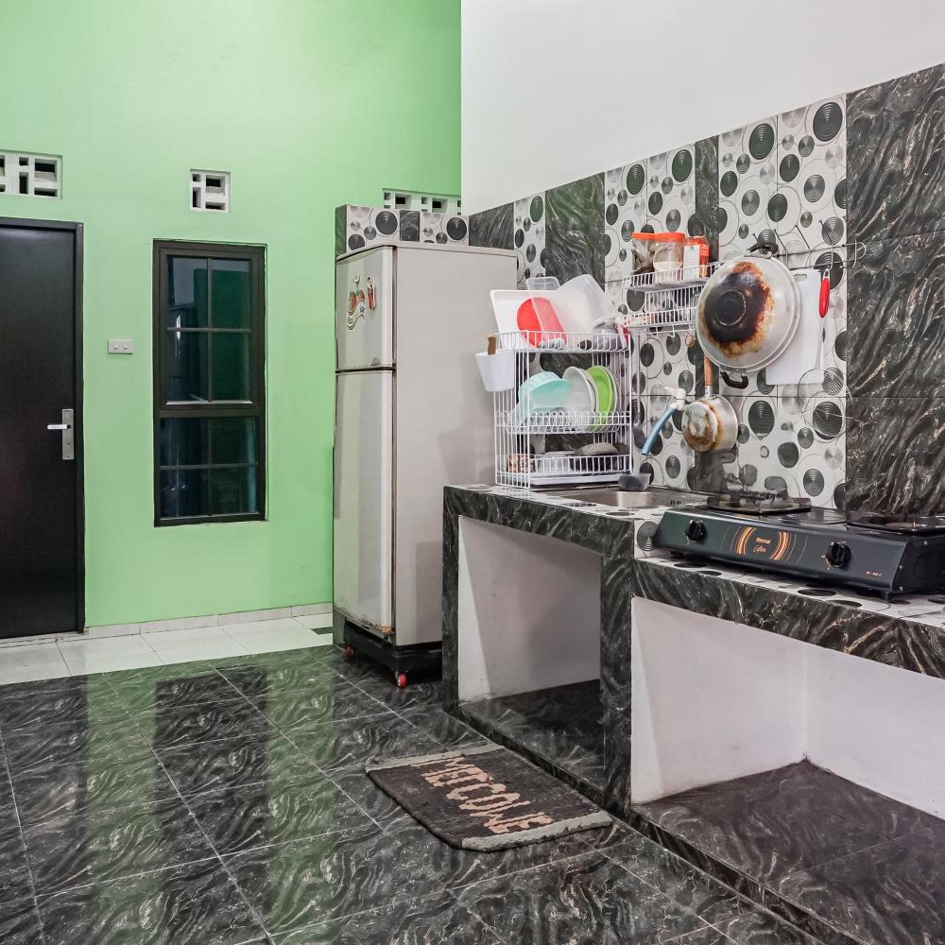 Hotel O Guest House Riharti Syariah 7/43