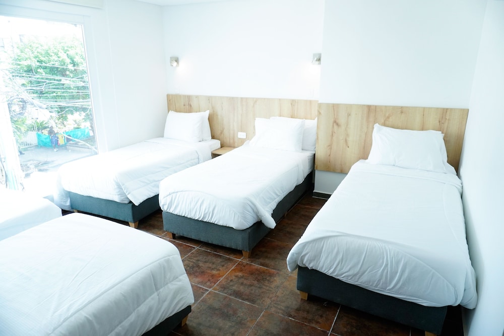 غرفة قياسية رباعية بسريرين كوين بإطلالة على المدينة، Hotel Caribbean Cartagena 5/10