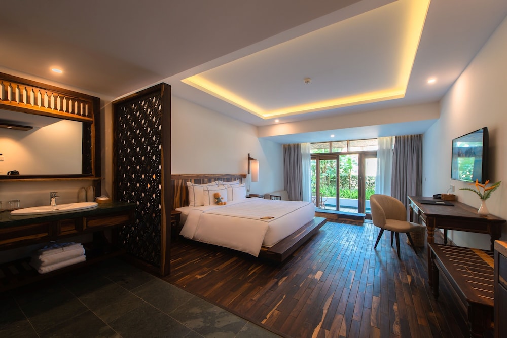 غرفة بسرير كينج بشرفة، Alibu Resort 3/4