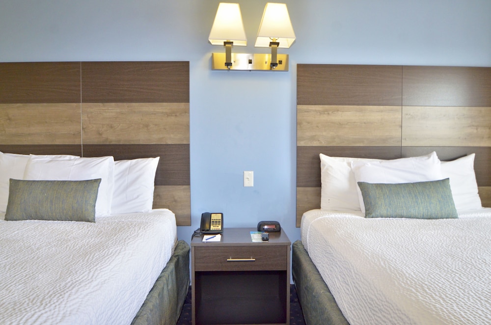 coastal palms inn and suites