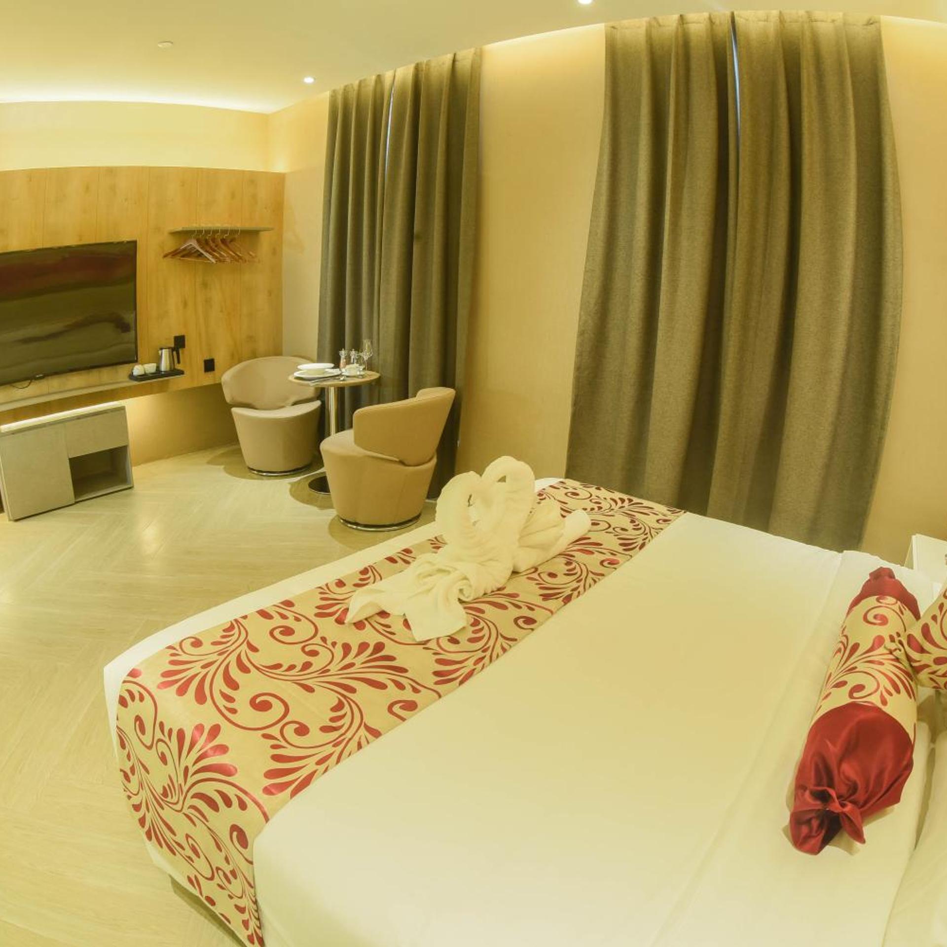 جناح تنفيذي بسرير كينج، Red Hotel Cubao 3/10