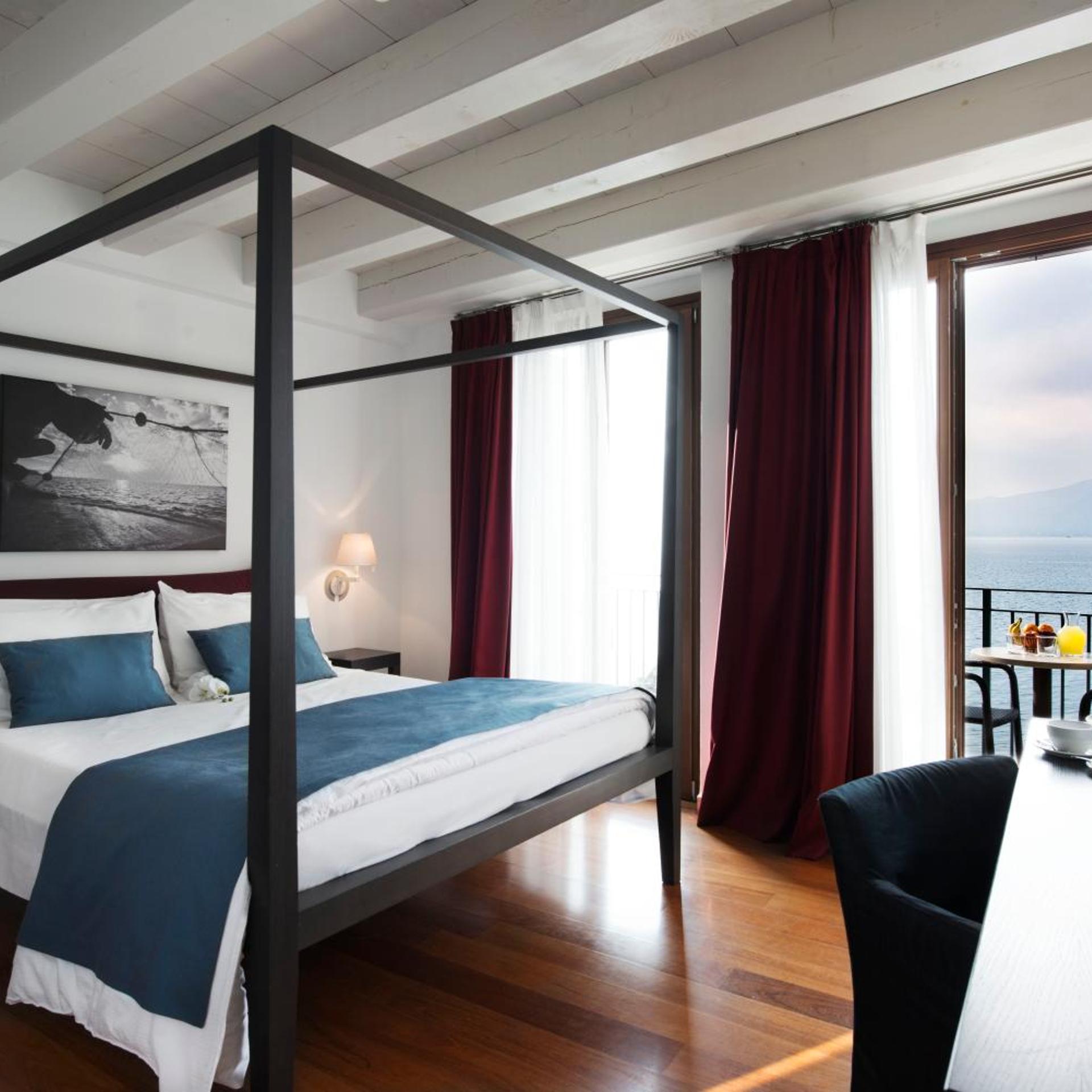 غرفة ديلوكس بسرير مزدوج بإطلالة على البحيرة، Hotel del Porto 4/7