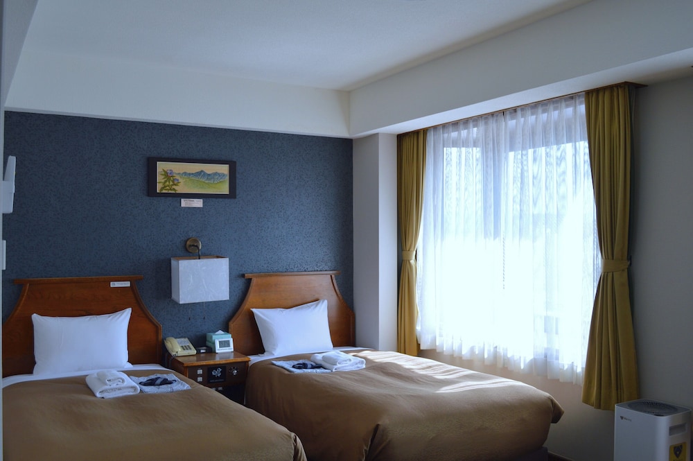 DELUXE, TWIN BEDS