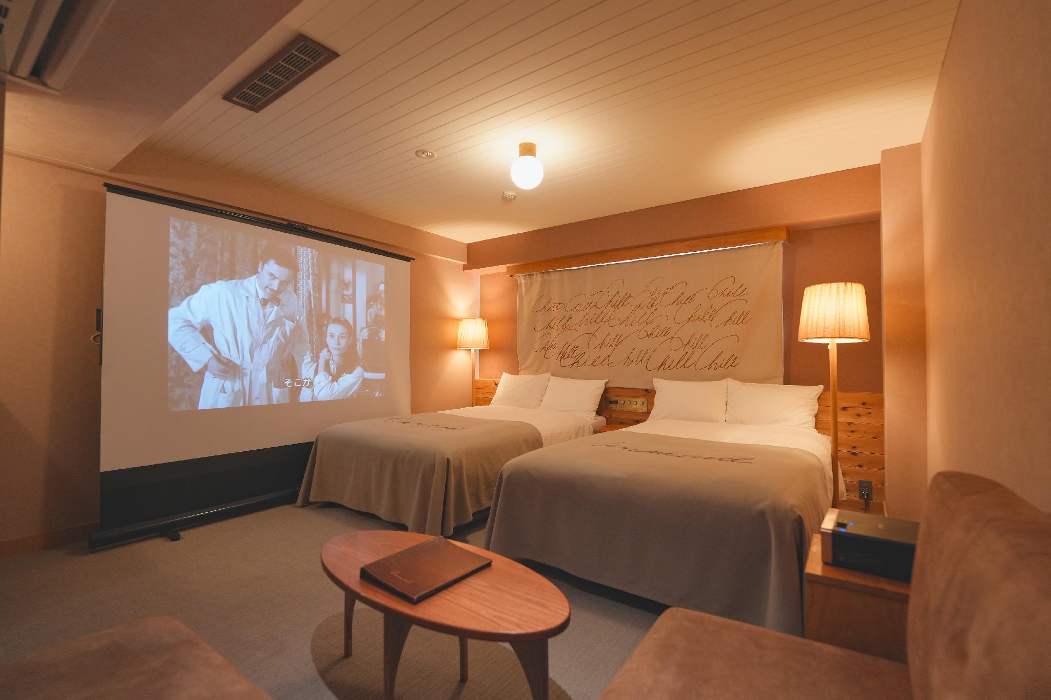 Semi Room, Theater, 2 Semi Double Beds