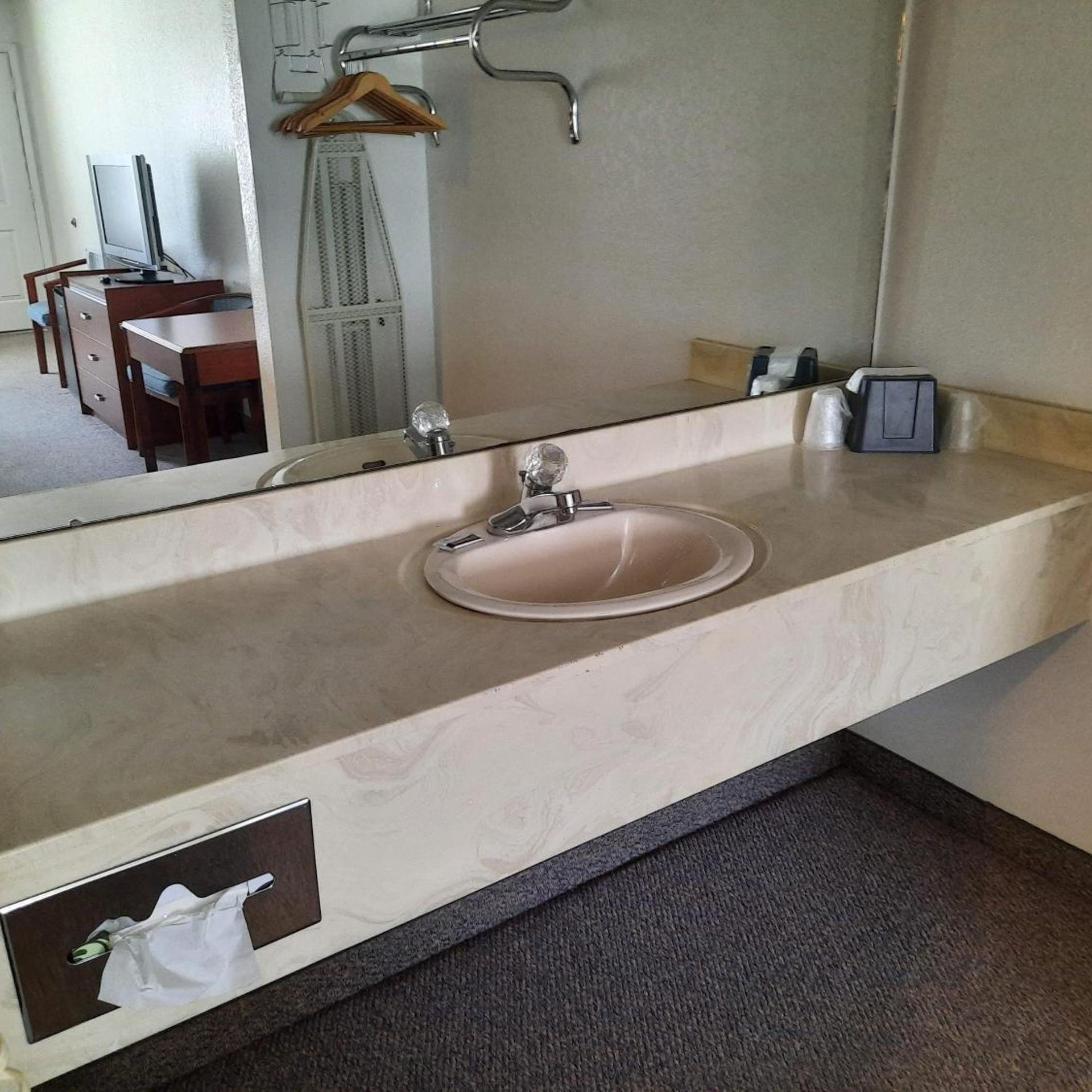 Blue Ribbon Inn and Suites 24/26