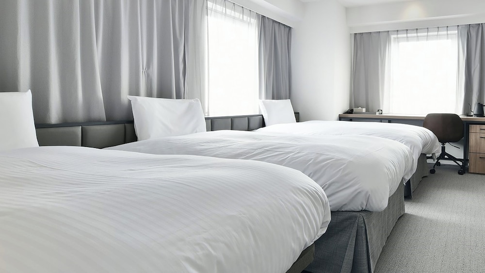 DELUXE, TWIN BEDS, WITH EXTRA BED