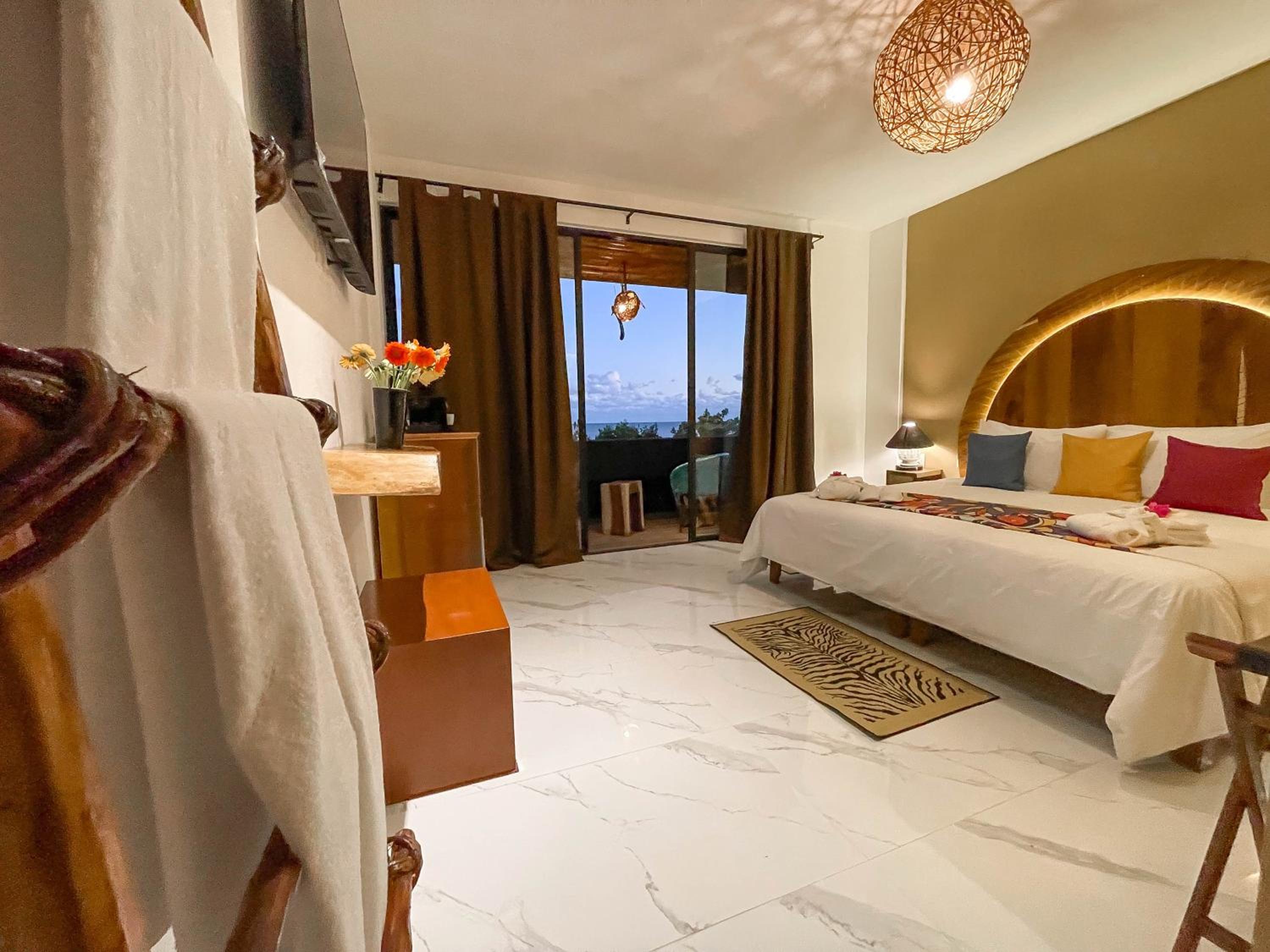 غرفة ديلوكس بسرير مزدوج بإطلالة على البحر، Akuazul Resorts Adults Only 2/10
