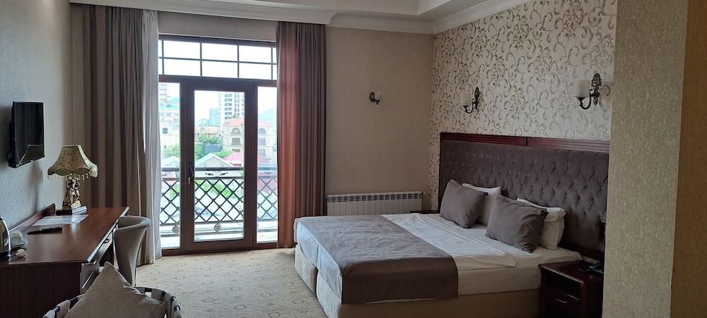 غرفة كومفورت رباعية بأربعة أسرّة، Capitol Hotel 2/7