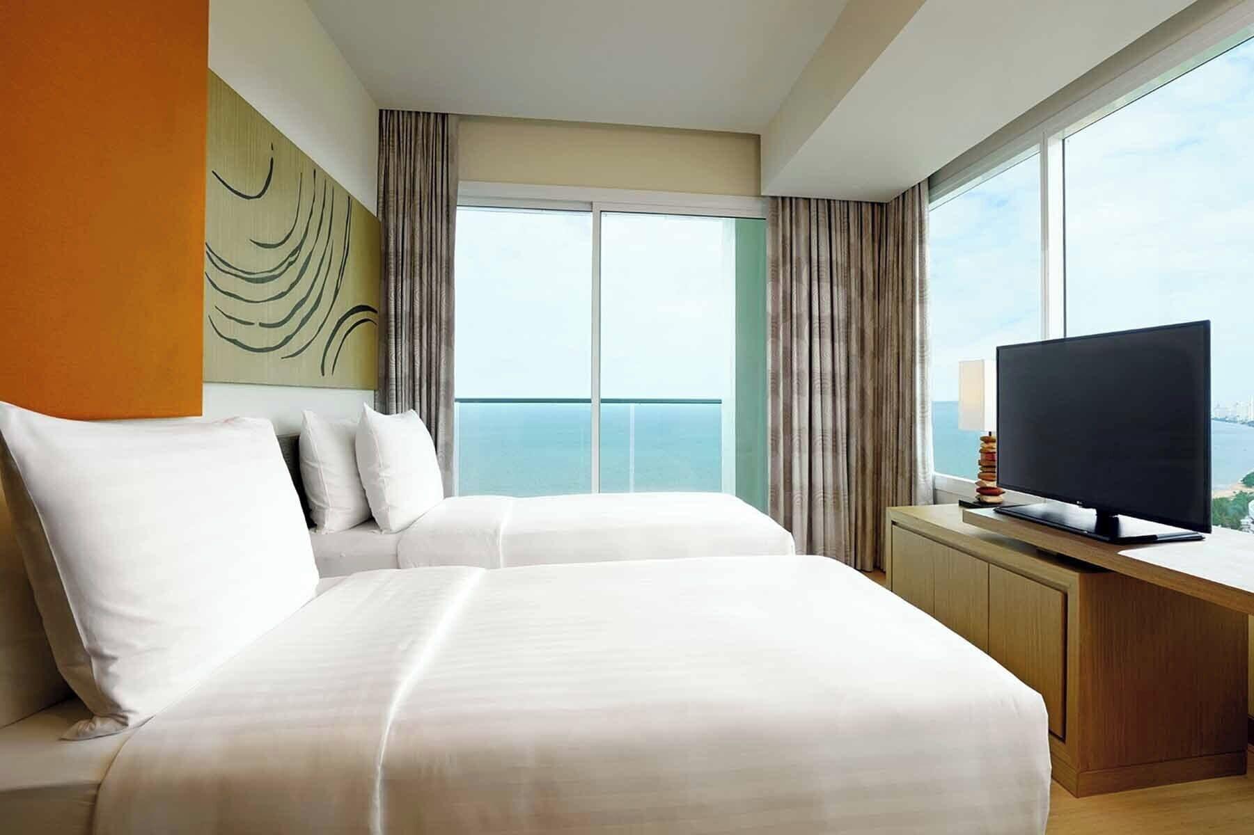family suite, multiple beds, sea view
