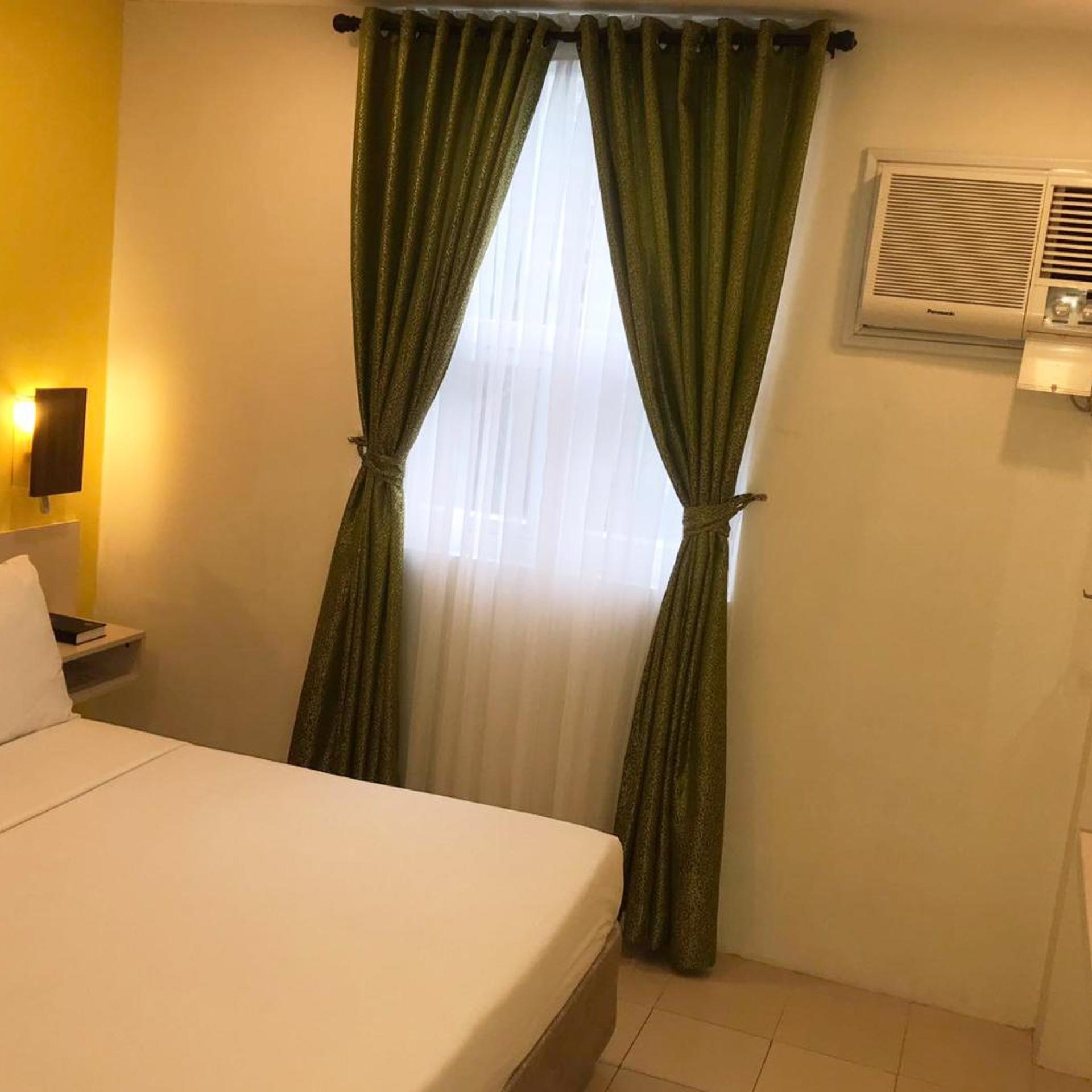 غرفة ديلوكس بسرير كينج وسرير كوين، Cebu Uncle Tom's Cabin Hotel 10/10