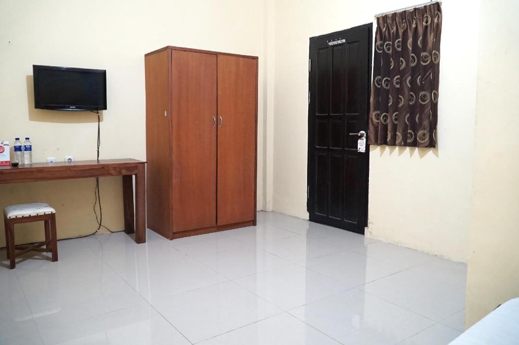 OYO 1034 Pondok Mulia Guest House 13/33