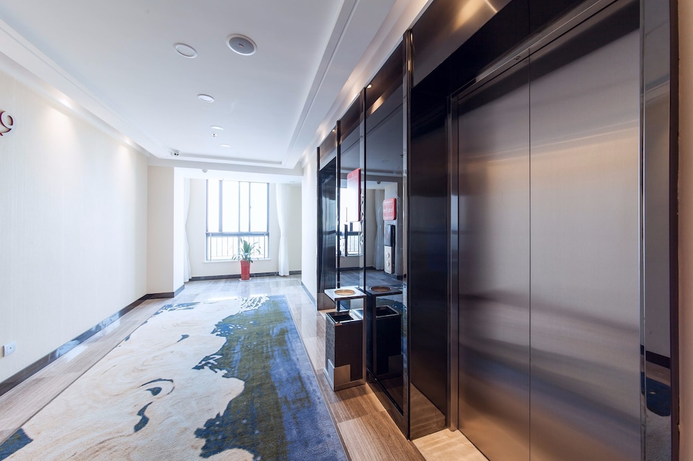 Suisse Place Hotel Residence Cmctaizhou 9/19
