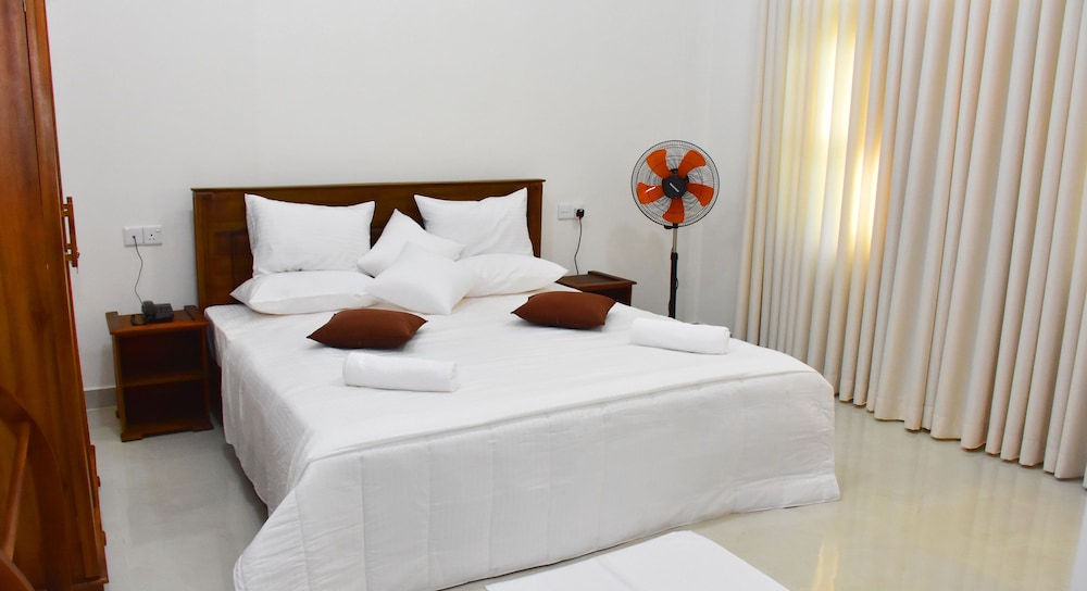 غرفة ديلوكس بسرير كينج بإطلالة على الحديقة، Nine Arch Holiday Resort 3/8