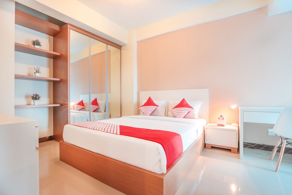 OYO Flagship 755 Appartel Grand Dhika City 11/39