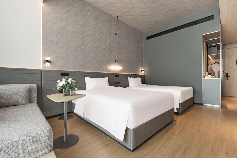 غرفة سوبيريور بسريرين منفصلين، Novotel Yinchuan Lanxigu 2/4