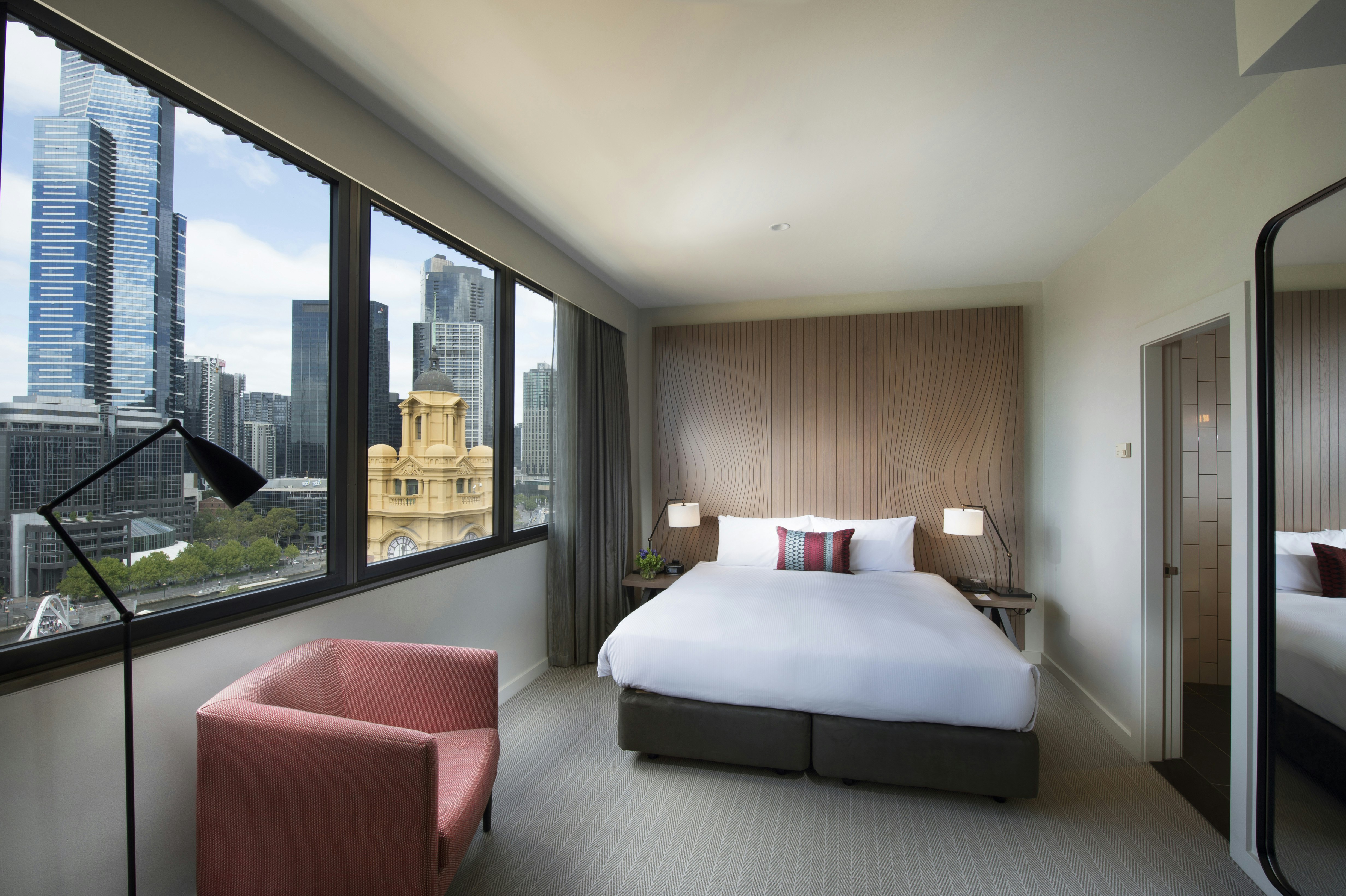 ROOM, KING BED, RIVER AND SKYLINE VIEW