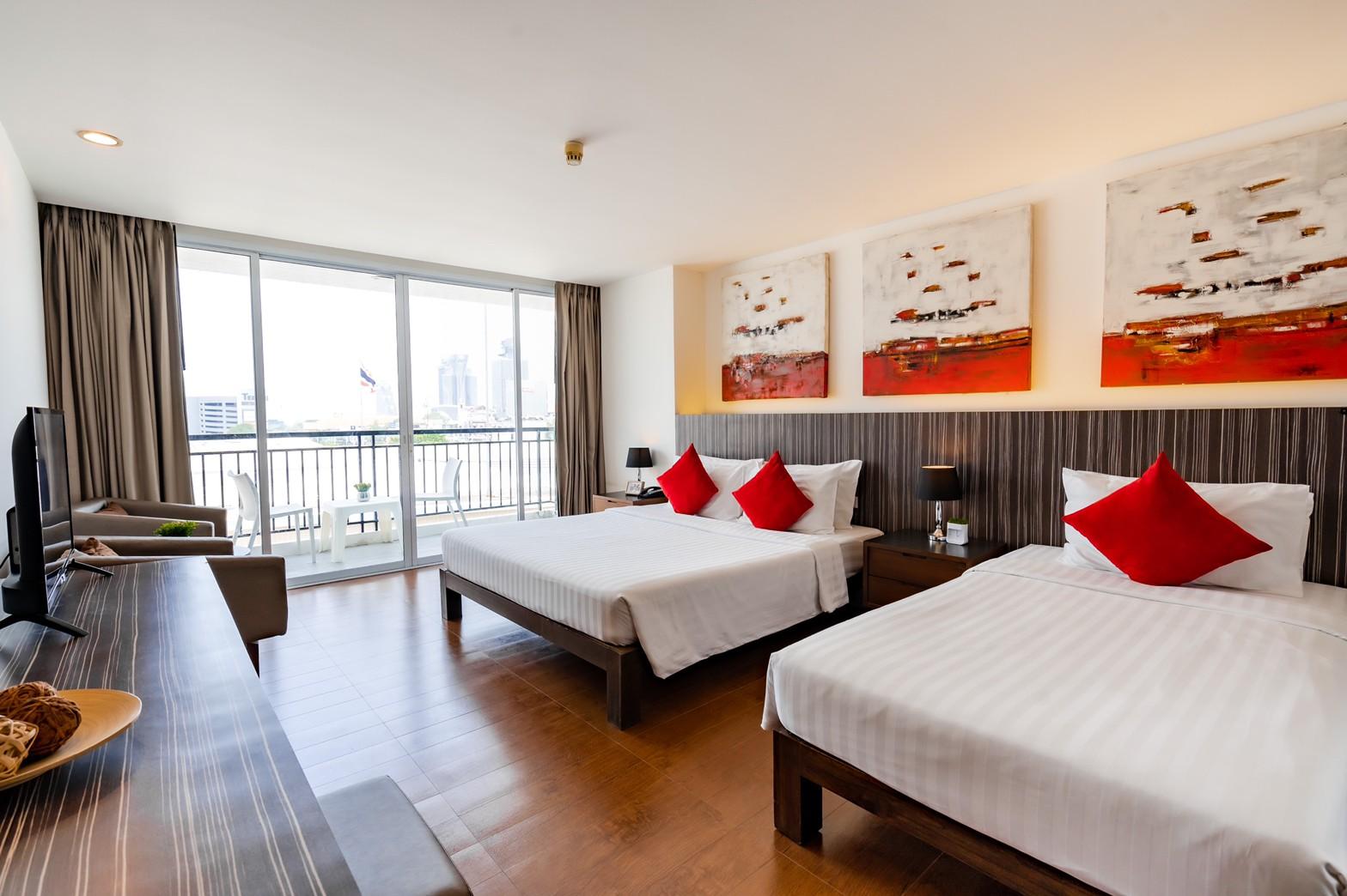 Deluxe, Triple, 1 Double and 1 Single Bed