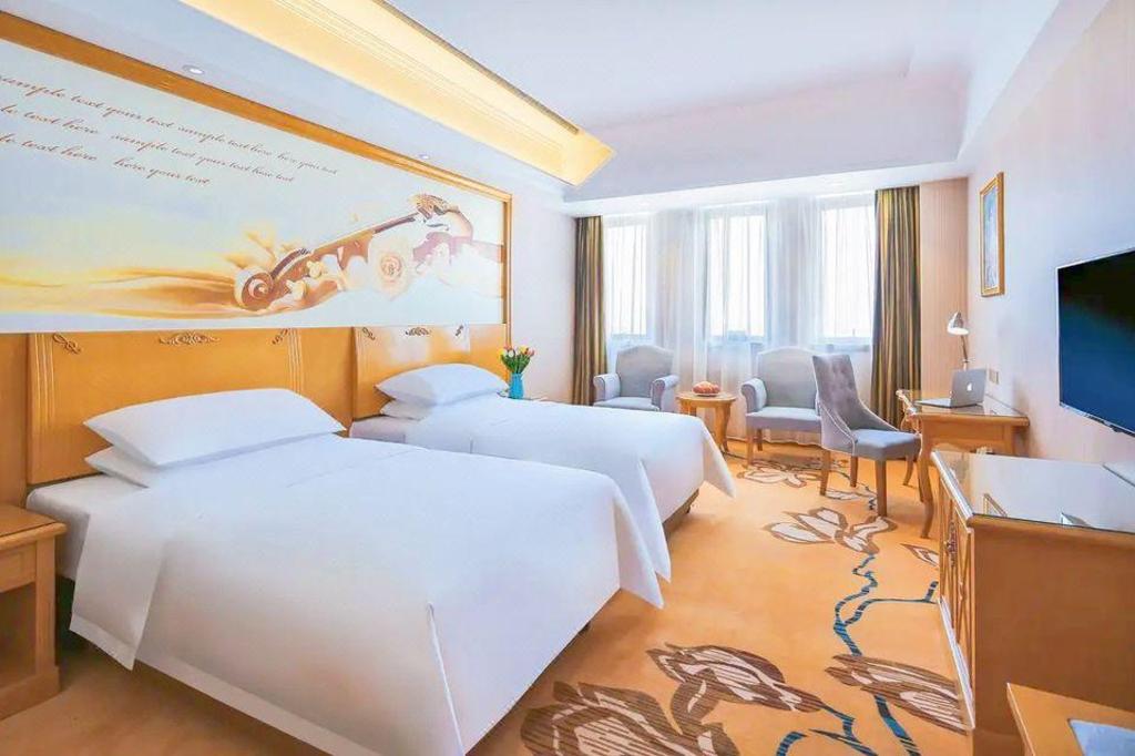 Vienna Hotel (Weihai North High-Speed Railway Station Bathing Beach Shandong University), Weihai 9/23