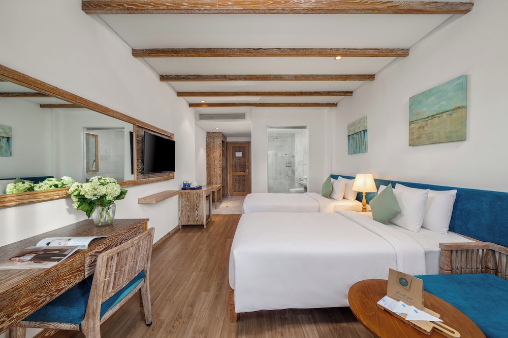 غرفة ديلوكس بسريرين منفصلين بإطلالة على المدينة بشرفة، Risemount Premier Resort Danang 6/9