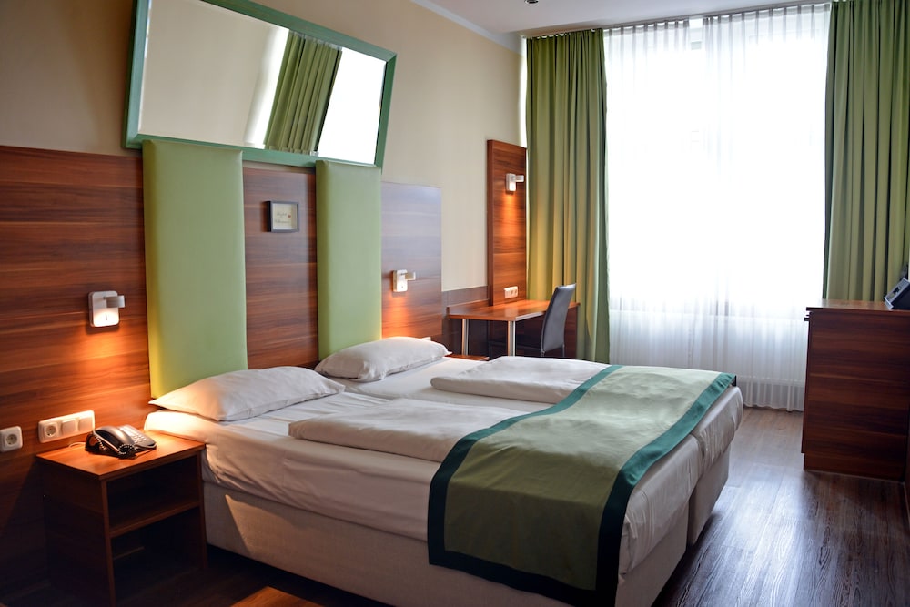 غرفة قياسية بسريرين منفصلين، Arthotel Munich 5/10