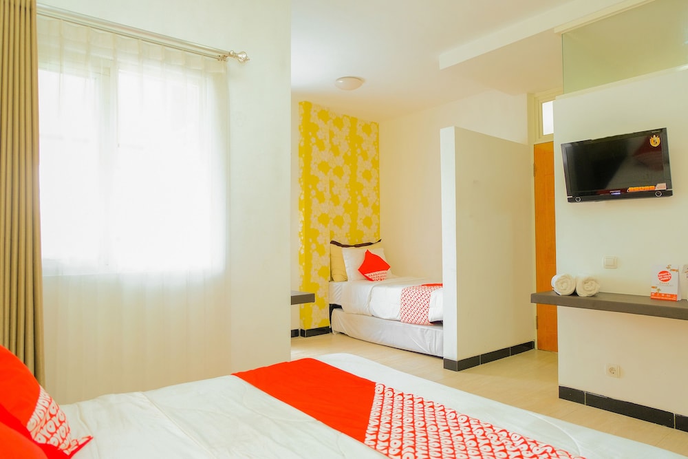 جناح عائلي بسريرين مزدوجين، OYO 354 32 Guest House 3/6