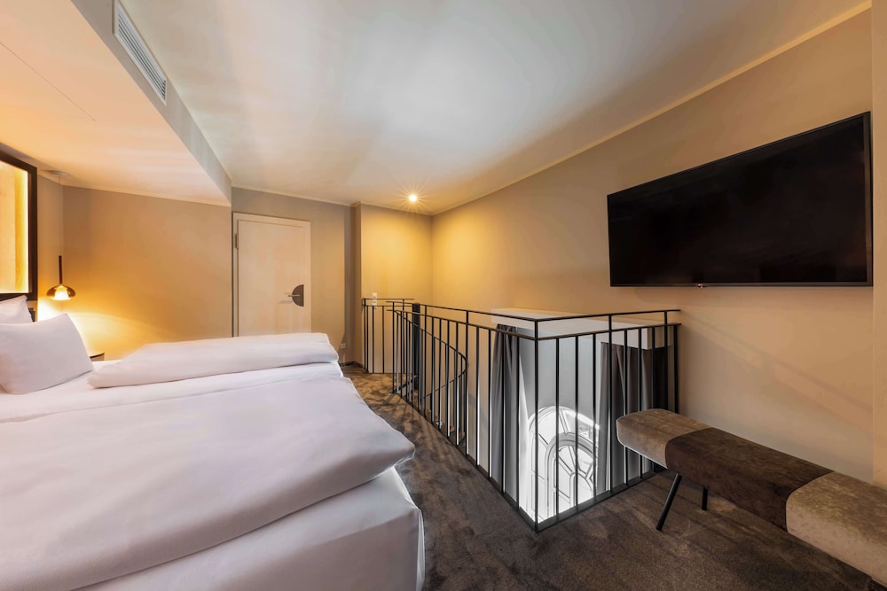 Room at HOTEL WASSERTURM COLOGNE CURIO COLLECTION BY HILTON, COLOGNE - KOELN
