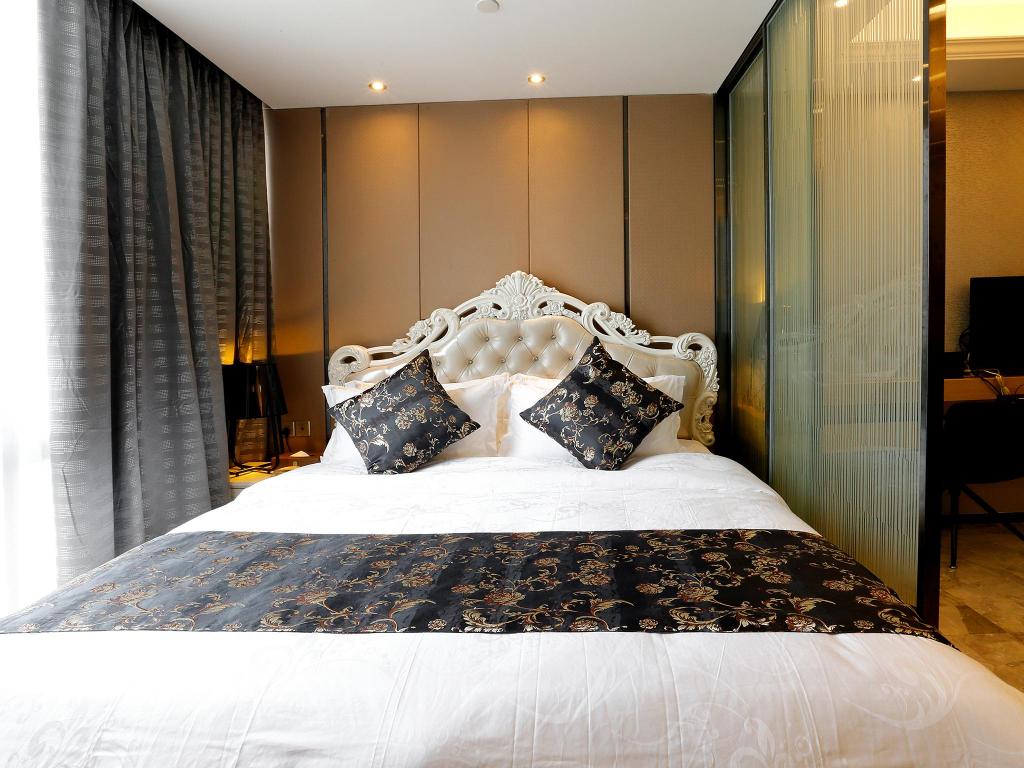 جناح تنفيذي بسرير كينج بغرفة نوم واحدة، Pengman International Apartment Hotel (Beijing Road Jiedeng Duhui) 4/10