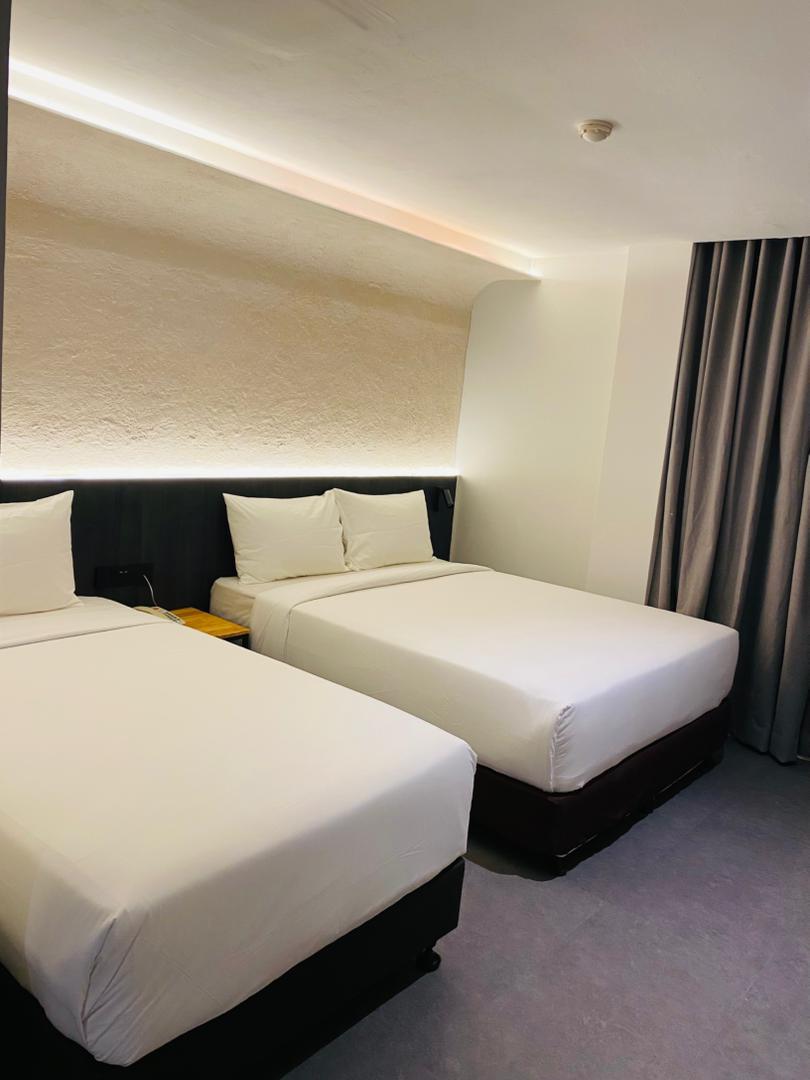 Super, Deluxe, Triple, 1 Queen and 1 Single Bed