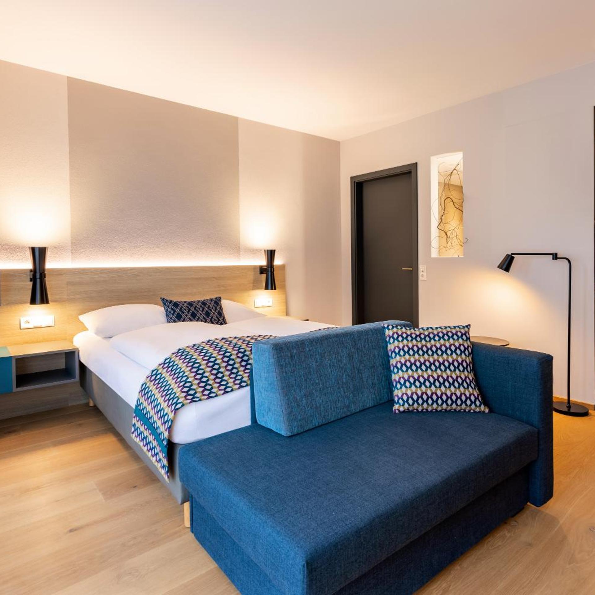 غرفة ديلوكس بسرير كوين مع أريكة، Parkhotel Maximilian Ottobeuren 3/10