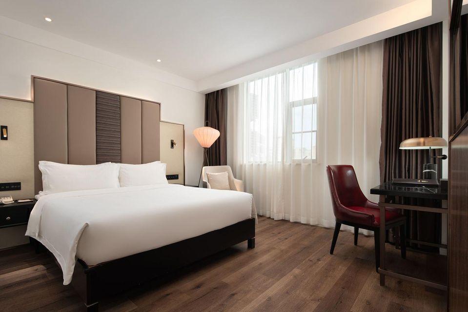 غرفة قياسية بسرير كوين، Metropolo Jinjiang Hotel (Haikou East High-speed Railway Station, Normal University) 2/2