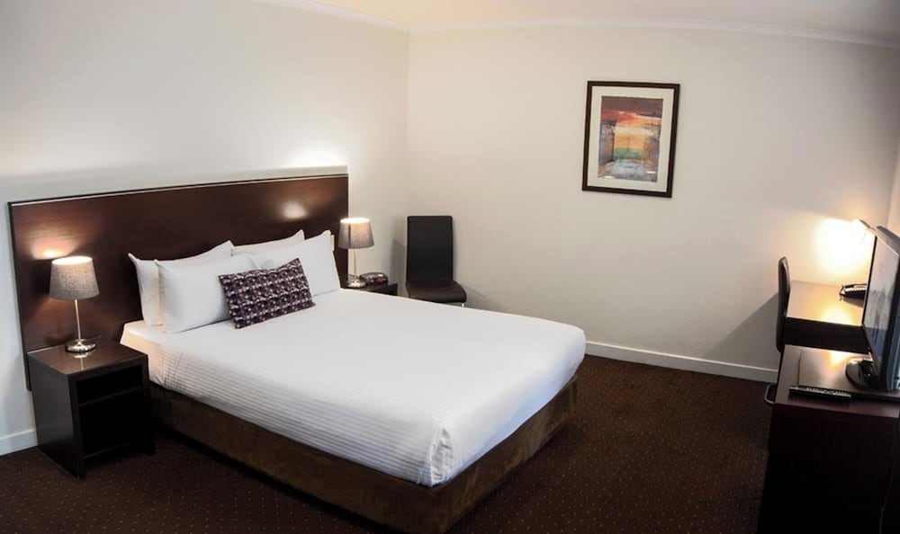 2 Bedrooms, Family Suite, Queen and Twin Beds