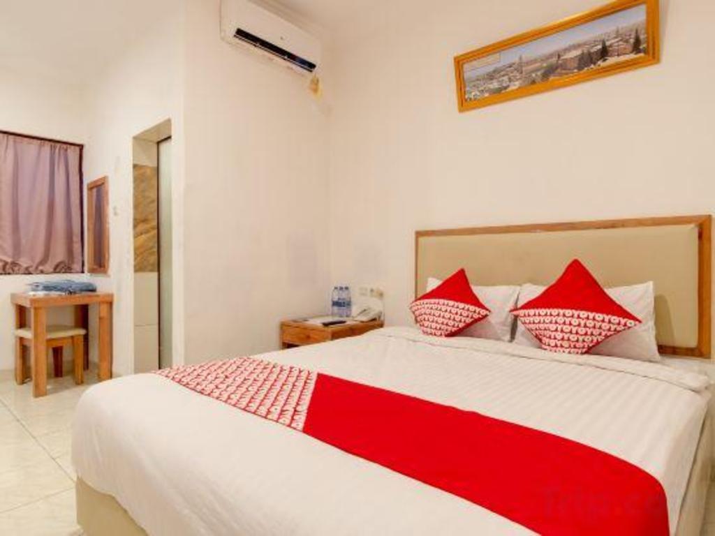 OYO 1034 Pondok Mulia Guest House 15/33