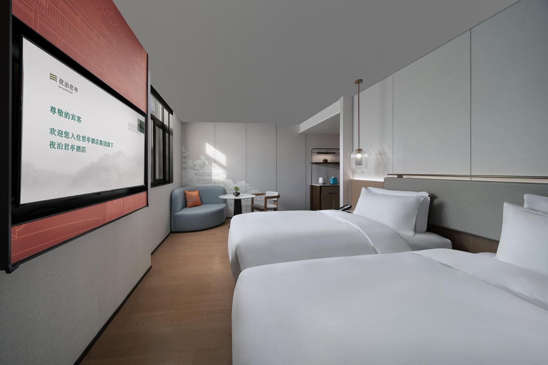 غرفة بسريرين منفصلين بإطلالة على الحديقة، SSAW Garden Hotel Beijing 4/6