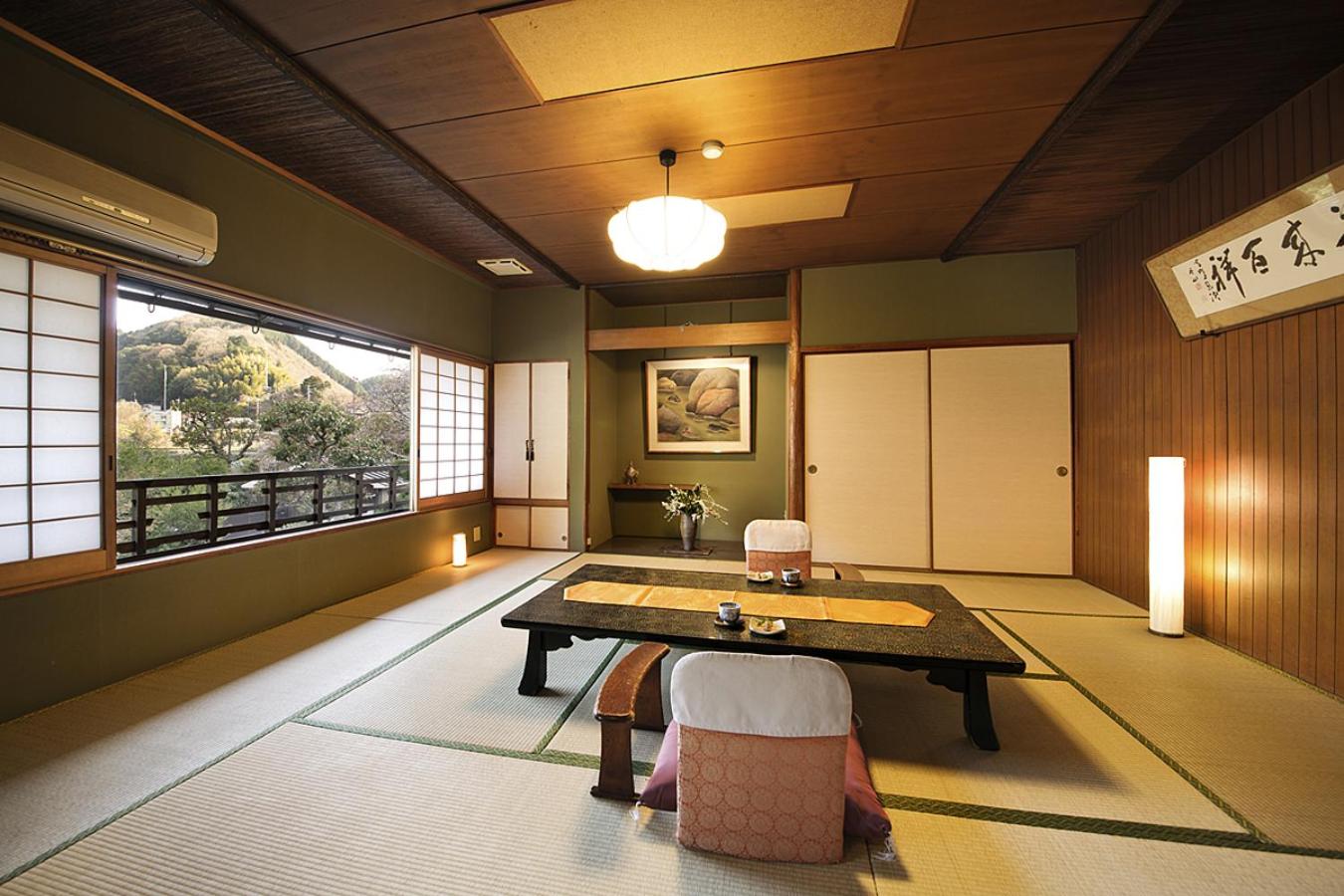 غرفة يابانية قياسية بحمام مشترك، Amami Onsen Nanten-En 2/2