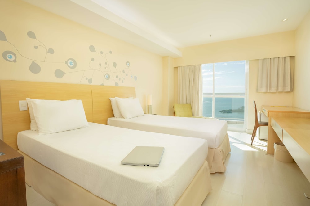 Golden Tulip Macae 7/36